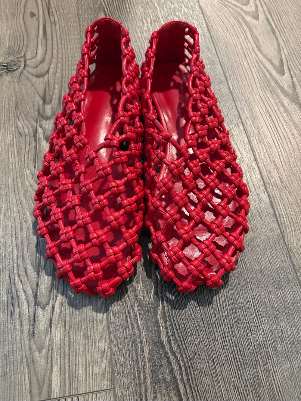 Red woven flats
